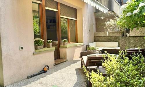 TRILOCALE ARREDATO CON GIARDINO, CANTINA E BOX